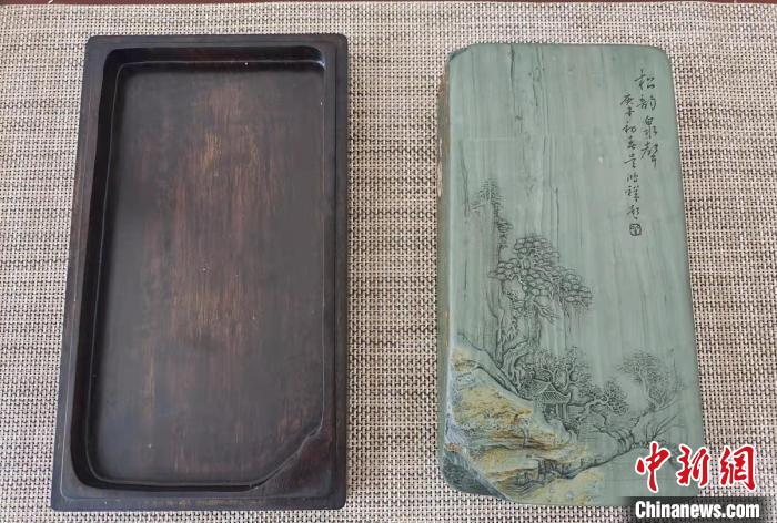 圖為盧保勝為提升洮硯文化內(nèi)涵，制作“一硯一銘、一盒一拓”成品展示。　張婧 攝